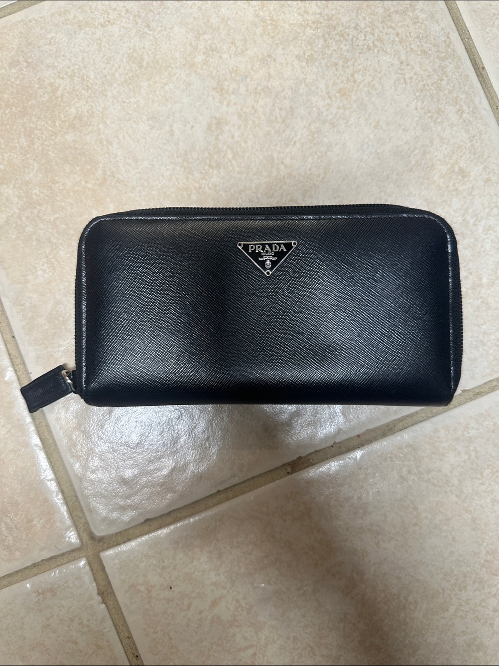 PRADA Black Leather women’s zippy wallet